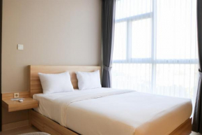 Wonderful and Homey 1BR Ciputra International Apartment By Travelio